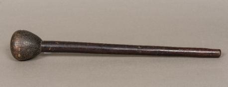 A 19th century carved wooden tribal club,