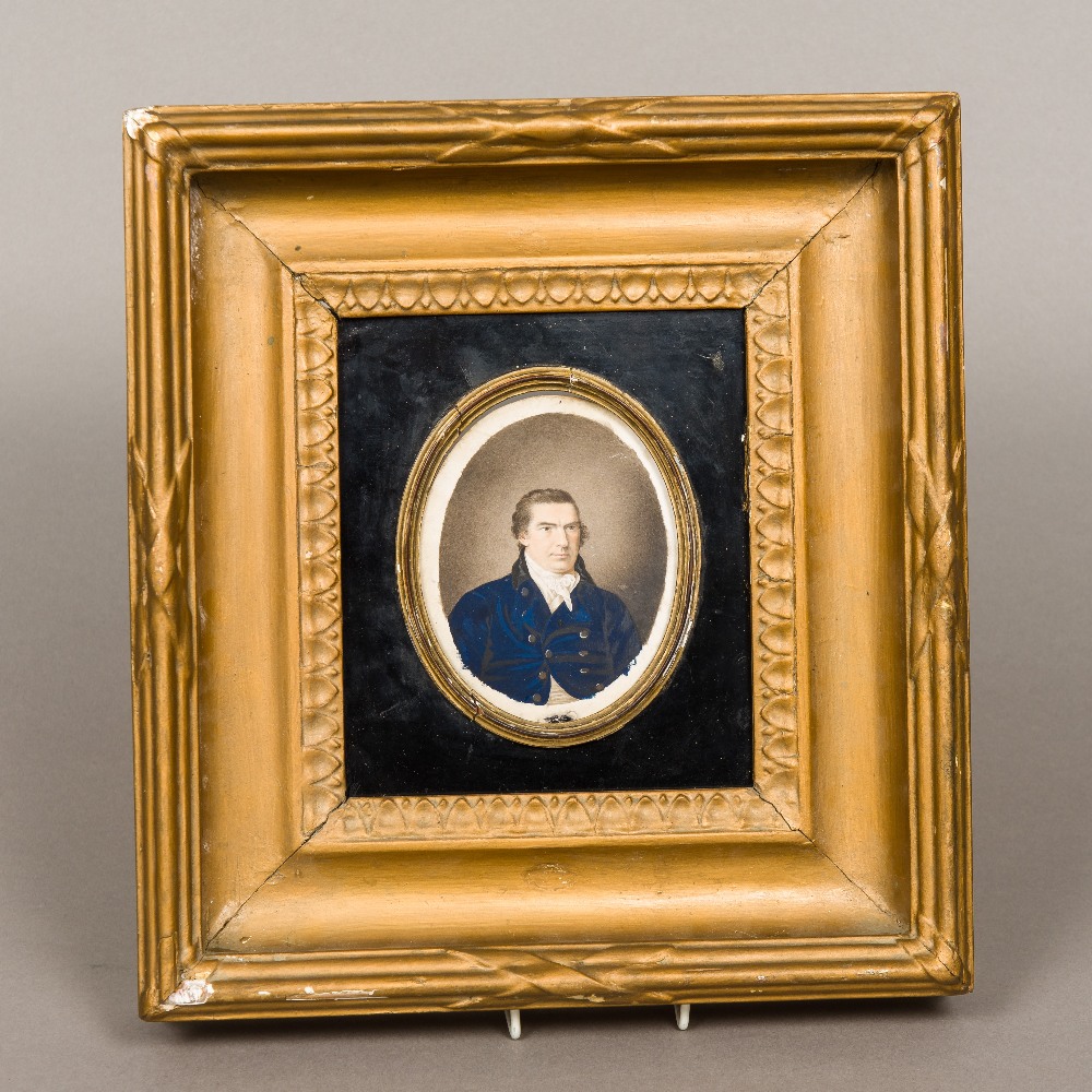 ENGLISH SCHOOL (early 19th century) Portrait miniature of a gentleman in a blue coat Watercolour