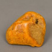 A natural amber ingot Approximately 184.5 grammes. 9 cm wide.