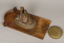 A Victorian patinated bronze mounted oak wall hanging gong hanger The oak backing set with a finely