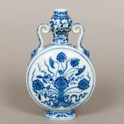 A Chinese blue and white porcelain moon flask Decorated with floral sprays interspersed with lotus