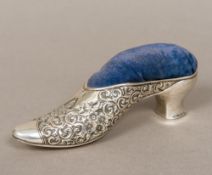 A large Victorian silver pin cushion formed as a shoe, hallmarks indistinct,