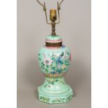 A 19th century Chinese porcelain ginger jar Decorated in the round in the famille rose palette