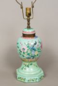 A 19th century Chinese porcelain ginger jar Decorated in the round in the famille rose palette