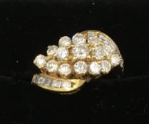 An 18 ct gold and diamond cluster ring