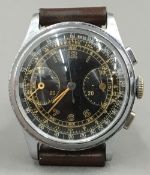 A mid-20th century gentleman's chronograph wristwatch With military style black multi-dial. 3.