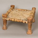 An African tribal stool The lattice worked seat animal hide. 21.5 cm high.