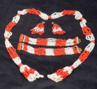 A red and white coral jewellery set