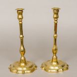 A pair of 18th century brass candlestick