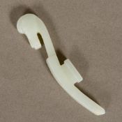 A Chinese pale jade belt hook