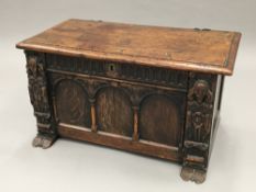 An 18th century and later oak coffer Of small proportions,