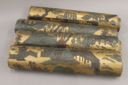 Four rolls of period, early 20th century, chinoiserie embossed decorated bronzed wallpaper. 54.