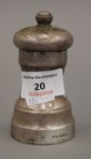 A silver clad pepper mill, hallmarked for London 1950, maker's mark for Collett and Anderson (5.