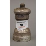 A silver clad pepper mill, hallmarked for London 1950, maker's mark for Collett and Anderson (5.