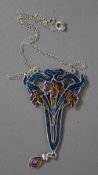 An Art Nouveau style silver and enamel pendant