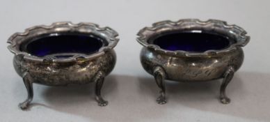 A pair of silver salts