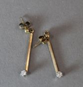 A pair of 9 ct rose gold diamond earrings (1.