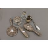 A silver mounted dressing table set and a Ronson plated table lighter
