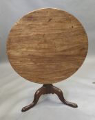 A George III mahogany tilt top tripod table.