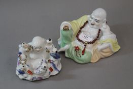 Two porcelain models of Buddha