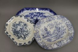 A 19th century Flow blue and white printed pottery meat plate, Whampoa pattern, 55 cm wide,