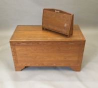 An Eastern carved camphor wood trunk and matching magazine rack