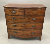 A 19th century mahogany bow front chest of drawers, with two short drawers over two long drawers.