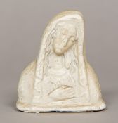 An antique terracotta bust of the Virgin Mary, with allover creamy glaze. 7 cm high.