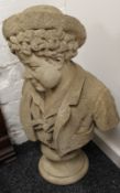 A carved marble bust of a young man
