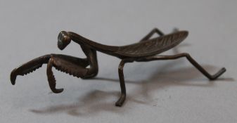 A Japanese bronze model of an praying mantis