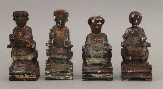 Four small Chinese painted wooden figures