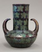 DOMINIQUE ZUMBO (1854-1939) French, iridescently decorated twin handled vase,