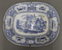 A Victorian blue and white printed pottery meat plate,