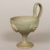 After the Antique, a terracotta handled cup,