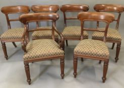 A set of seven mahogany dining chairs,