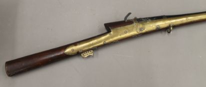 An antique match lock rifle,