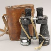 A pair of cased military binoculars, MK4X7,