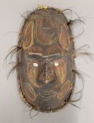 An Australasian tribal mask,