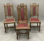A set of four carved oak dining chairs