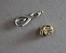 A 9 ct gold diamond pendant, together with another gold pendant (1.