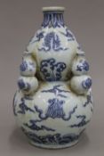 A blue and white porcelain double gourd vase,