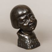 An early 20th century Viennese patinated bronze sculpture, formed as a bust of a crying girl,