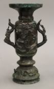 A Japanese bronze vase