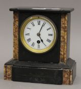 A Victorian marble mantle clock