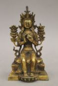 A gilt bronze model of Buddha