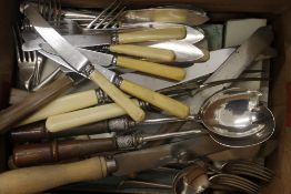 A large quantity of plated cutlery