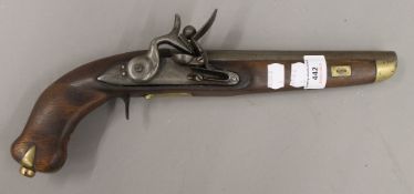 A reproduction flint lock pistol