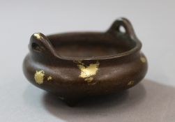 A small Chinese bronze gold splash censer