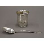 A Danish silver beaker and a Danish silver spoon (2.
