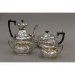 A silver four piece tea set (52 troy ounces total weight)